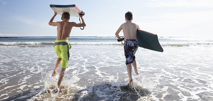 boys-boogie-boarding-ocean copy