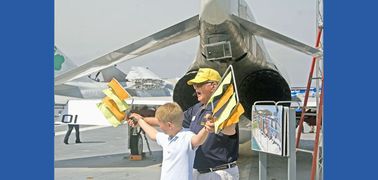 Uss Midway docent and child